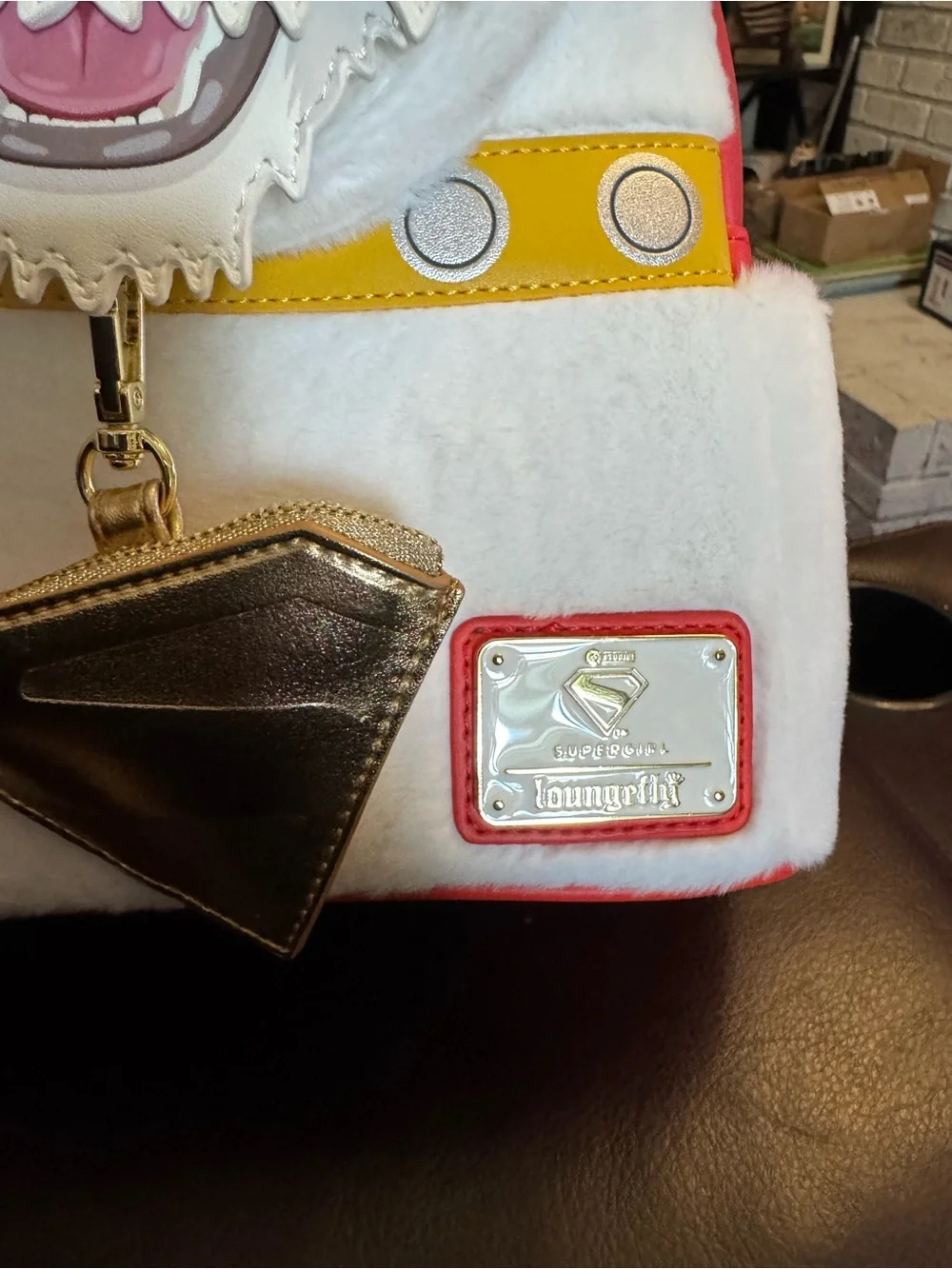 Loungefly White Dog Face Mini Backpack with Red and Yellow Accents Supergirl
